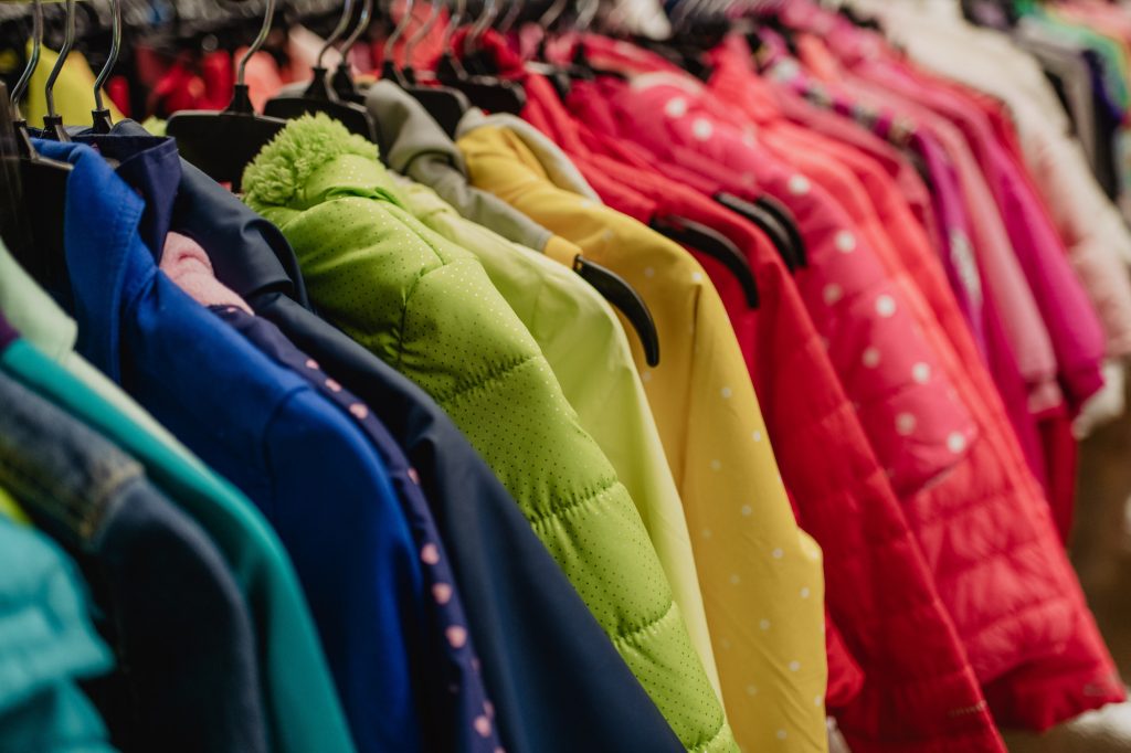 Clothes displayed for National Thrift Store Day
