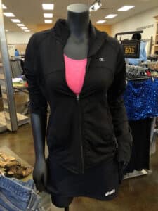Mannequin with black tracksuit displayed inside Goodwill Store & Donation Center