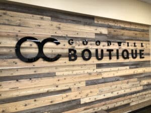 OC Goodwil Boutique signage displayed inside Goodwill Store & Donation Center