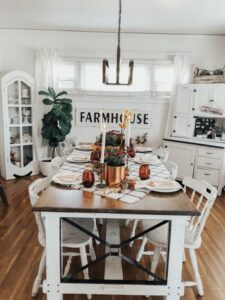 Kitchen table with items that were bought at a thrift store