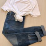 Plain white crew neck tee with blue jeans