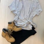 Striped white top and black leggings with boots