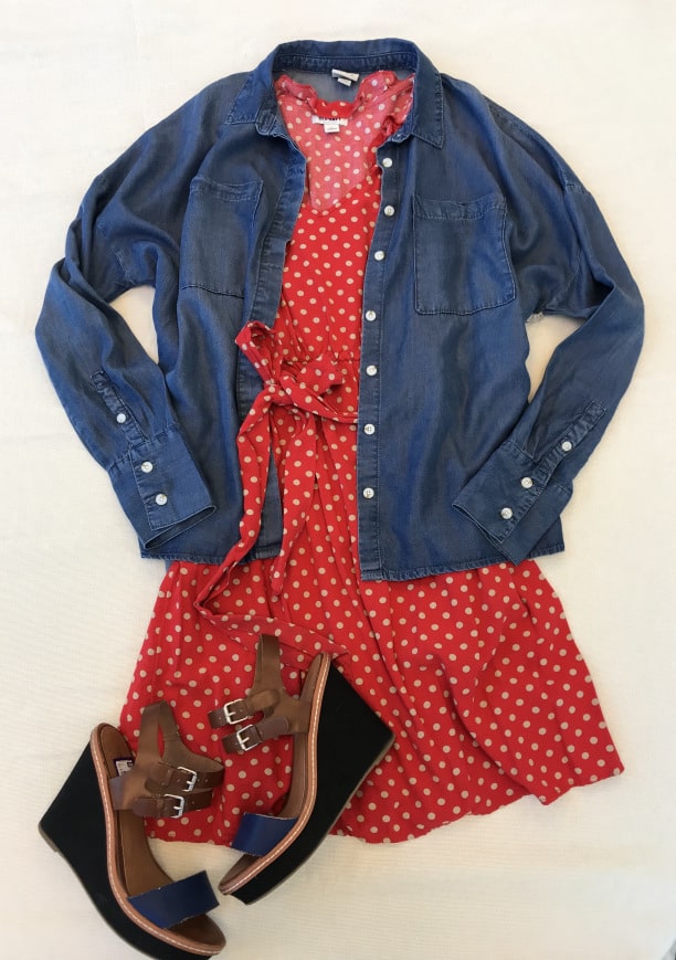 Red polka dot dress, jean jacket, and heels
