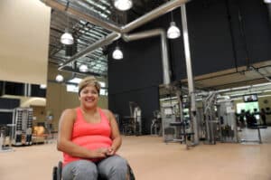 Devina Robias poses inside Goodwill of Orange County’s Rogers A. Severson Fitness & Technology Center