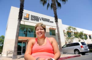 Devina Robias poses outside Goodwill of Orange County’s Rogers A. Severson Fitness & Technology Center