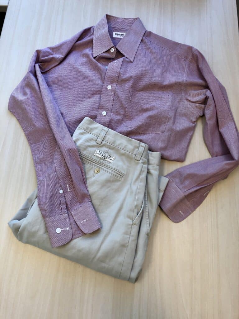 Pink hued long sleeve button down with a pair of classic khakis.