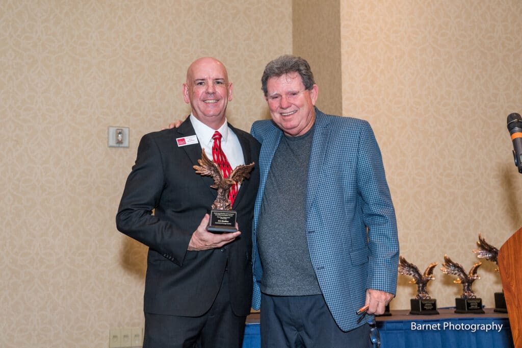 Goodwill of Orange County Business Development Manager receiving Chamber Ambassador of the Year Award at Santa Ana Chambers 2019