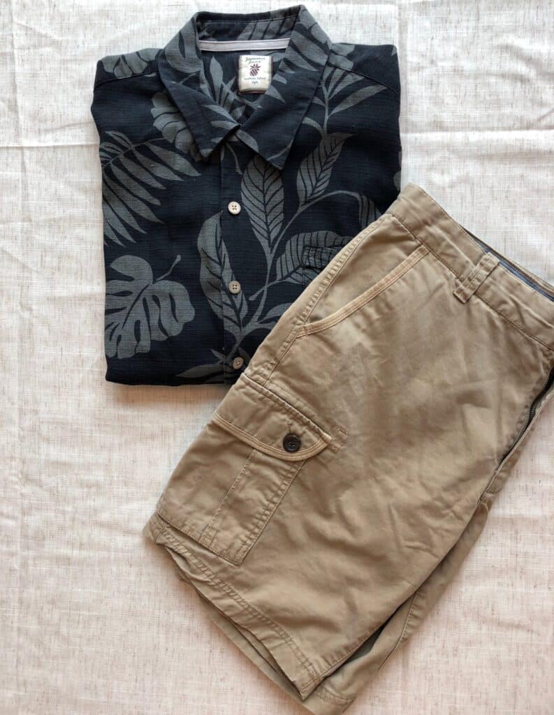 Classic pair of khaki shorts and a muted Hawaiian shirt