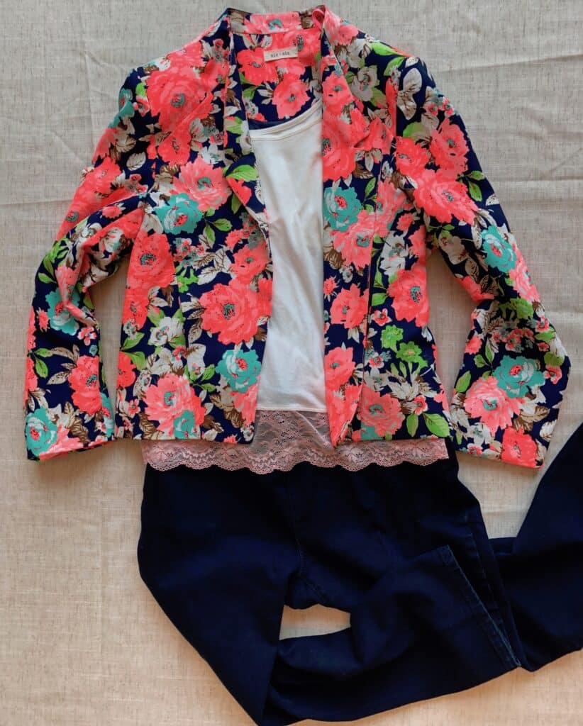 Neon fun blazer paired with a simple camisole and jeans