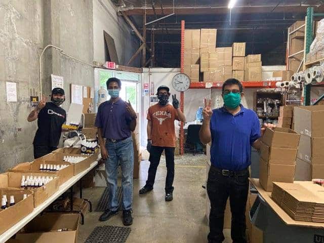 Four workers wearing masks at CareCo