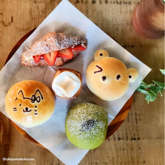 buns and croissants with stuffed strawberries