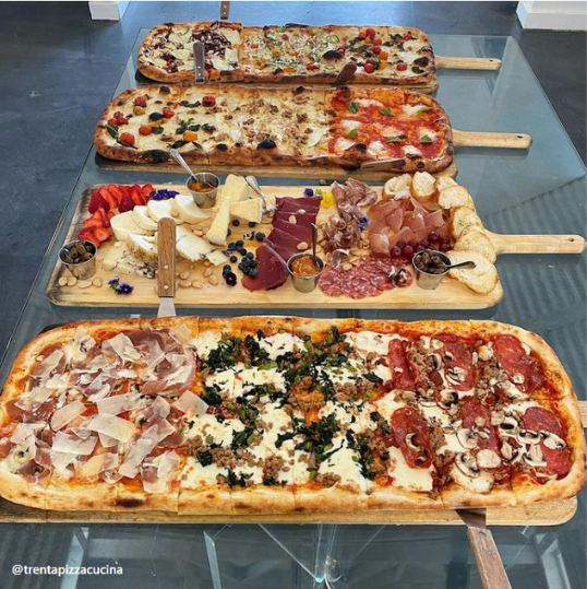 different types of Pizza and cheese board