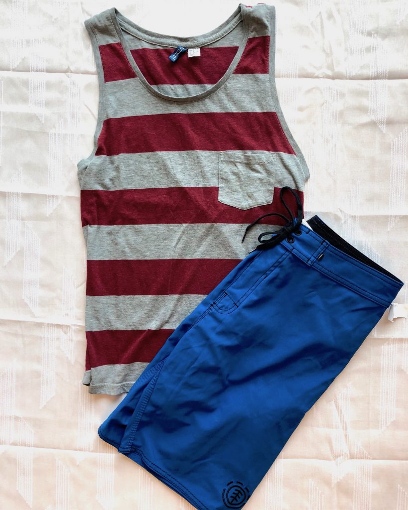 Sleeveless striped tee and blue trouser
