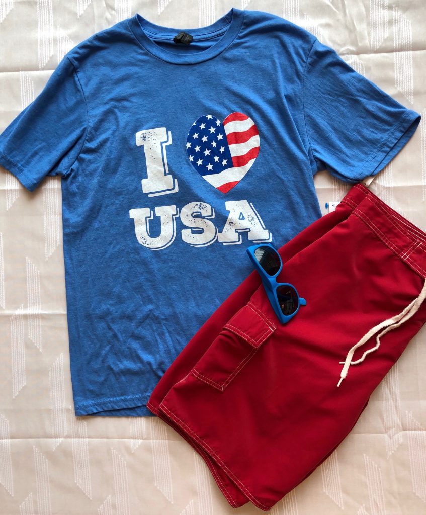 Blue graphic tee with red trouser