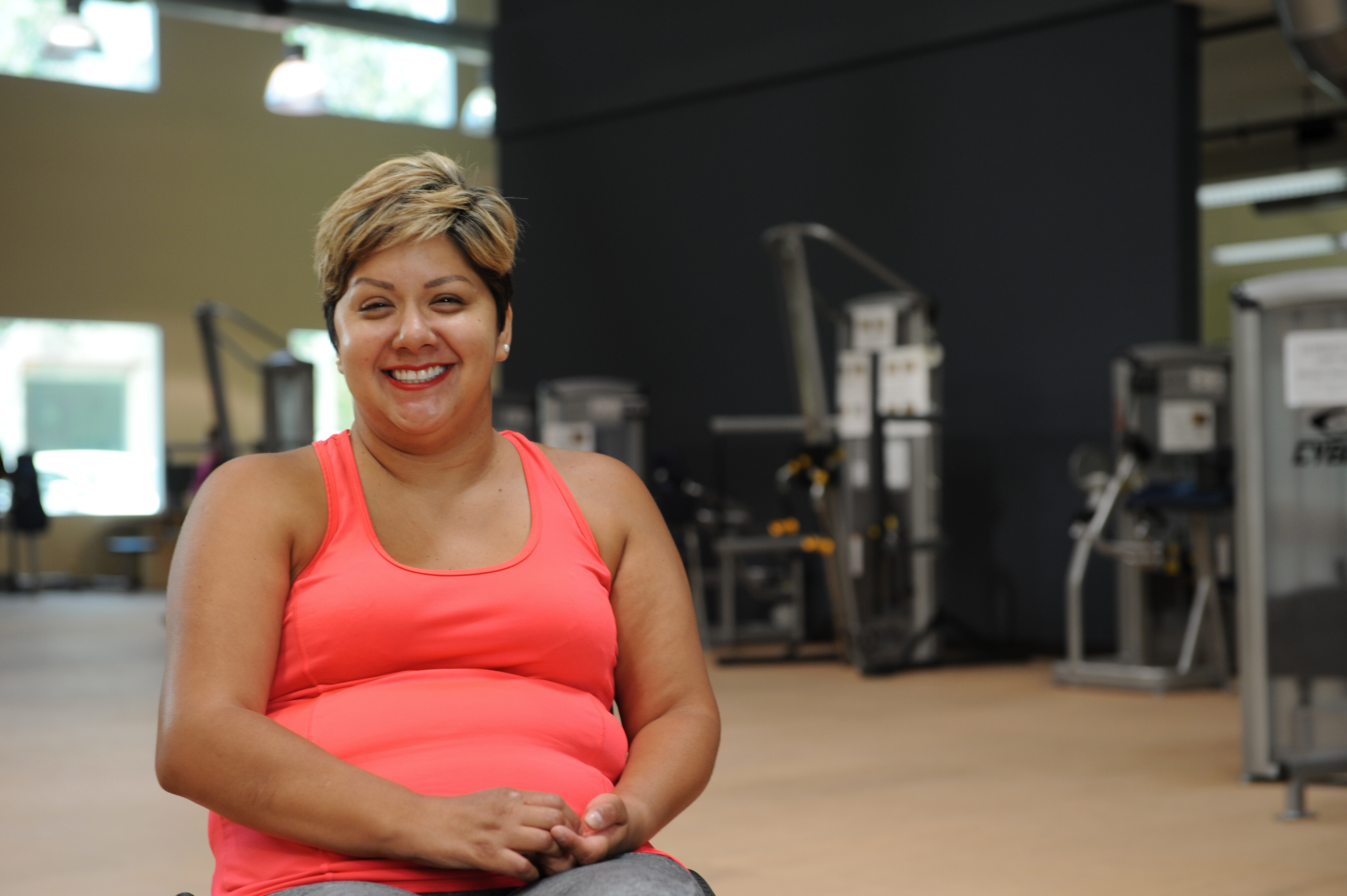 Devina Robias poses inside Goodwill of Orange County’s Rogers A. Severson Fitness & Technology Center