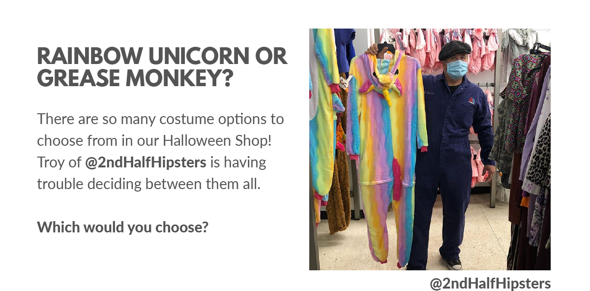 A man with mask holding a Rainbow unicorn costume